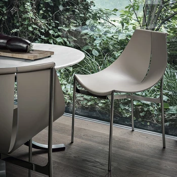 Современный простой кожаный обеденный стул из нержавеющей стали с седлом Скандинавский минималистичный обеденный стул Личность творческая